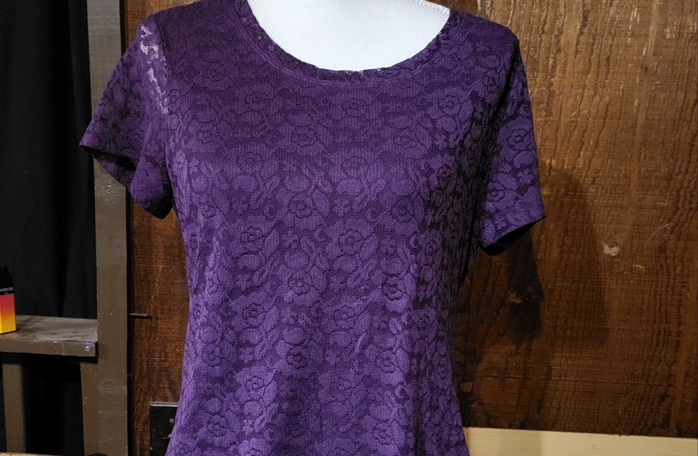Purple shirt with lace overtop